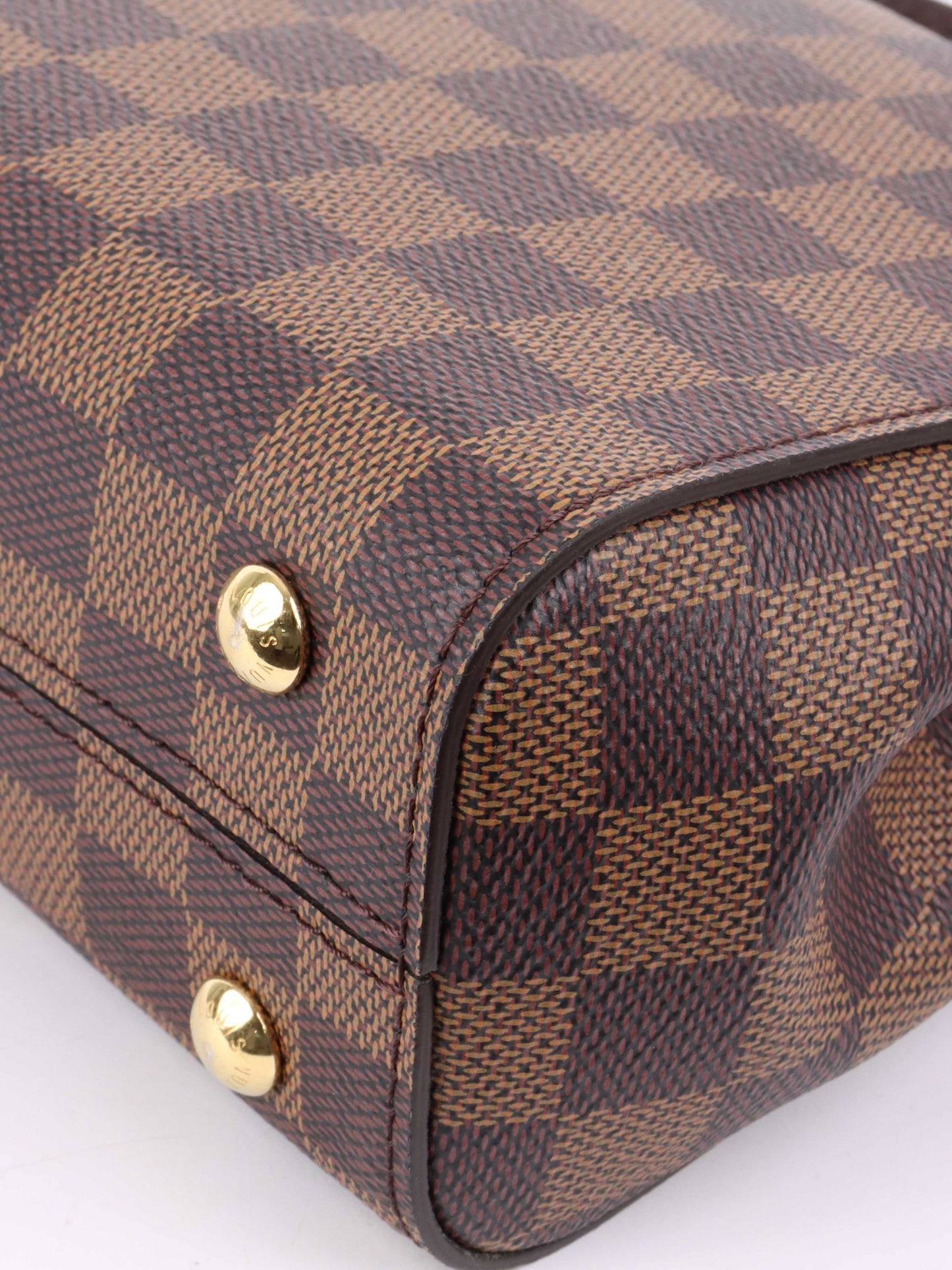Louis Vuitton Damier Ebene Mini Cluny.