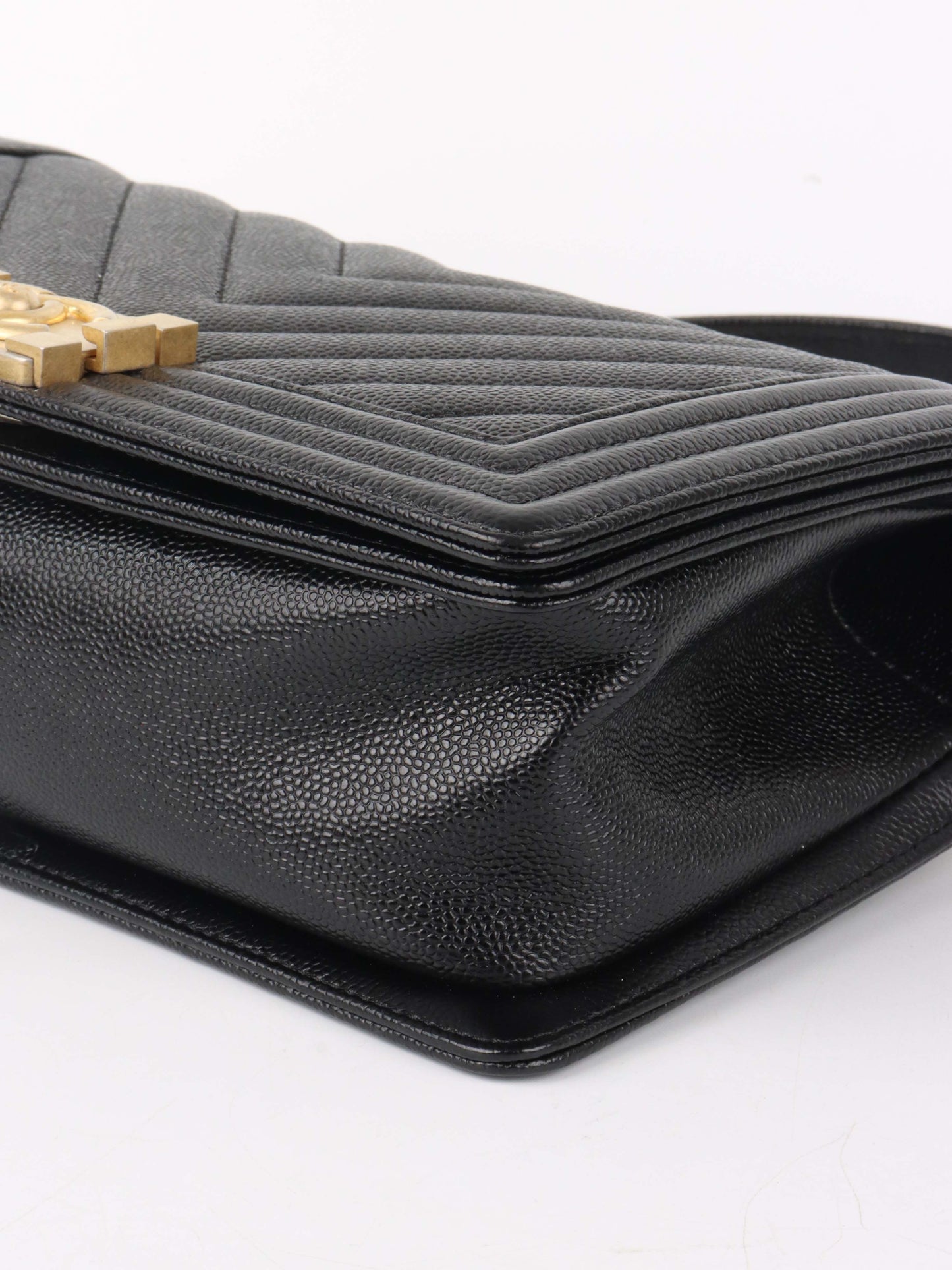 Chanel Black Chevron Caviar Medium Boy Bag.