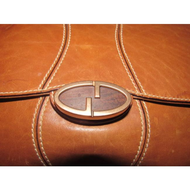 Gucci   Cognac Or Chestnut Leather With Contrast Stitching And Brass Hardware