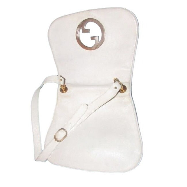 1970s Gucci white textured leather Blondie style saddle bag with XL gold GG logo cutout in mint condition