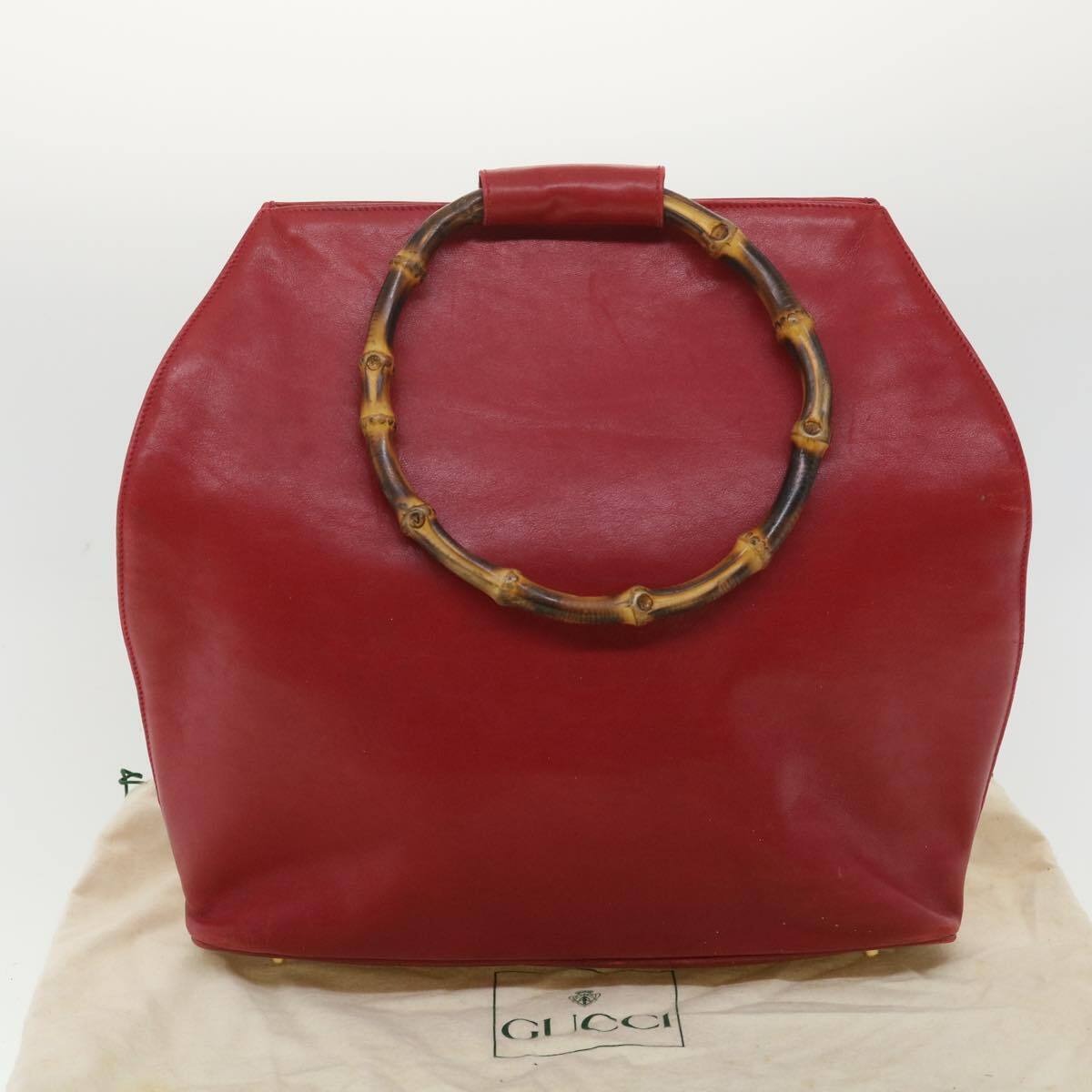 , mod look, Gucci, true red leather shopper with two round bamboo handles, a footed bottom, and gold accents
