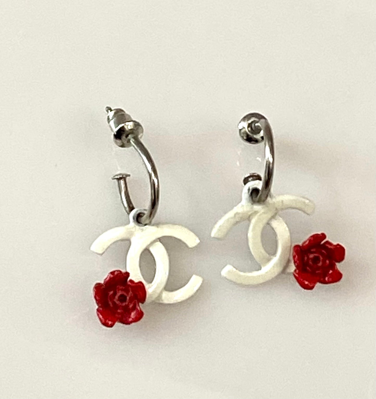 CHANEL SILVER PLATED DANGLE PIERCED EARRINGS