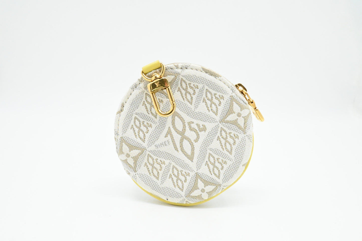 Louis Vuitton Porte Monnaie Round Coin Case in White Since 1854 Jacquard Canvas