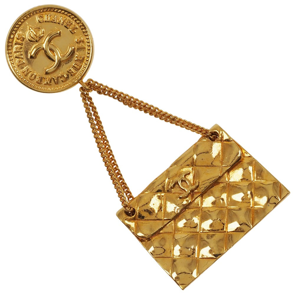 CHANEL Brooch Plated Gold gold   Matelasse bag motif COCO Mark Women