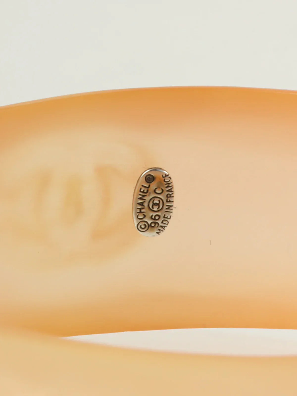 CHANEL 1996 Made Cc Mark Bangle Clear/Orange