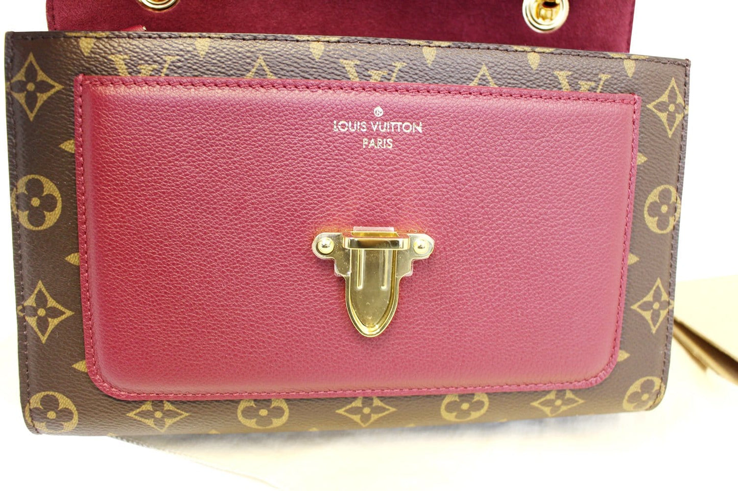 LOUIS VUITTON Monogram Canvas Raisin Victoire Shoulder Bag