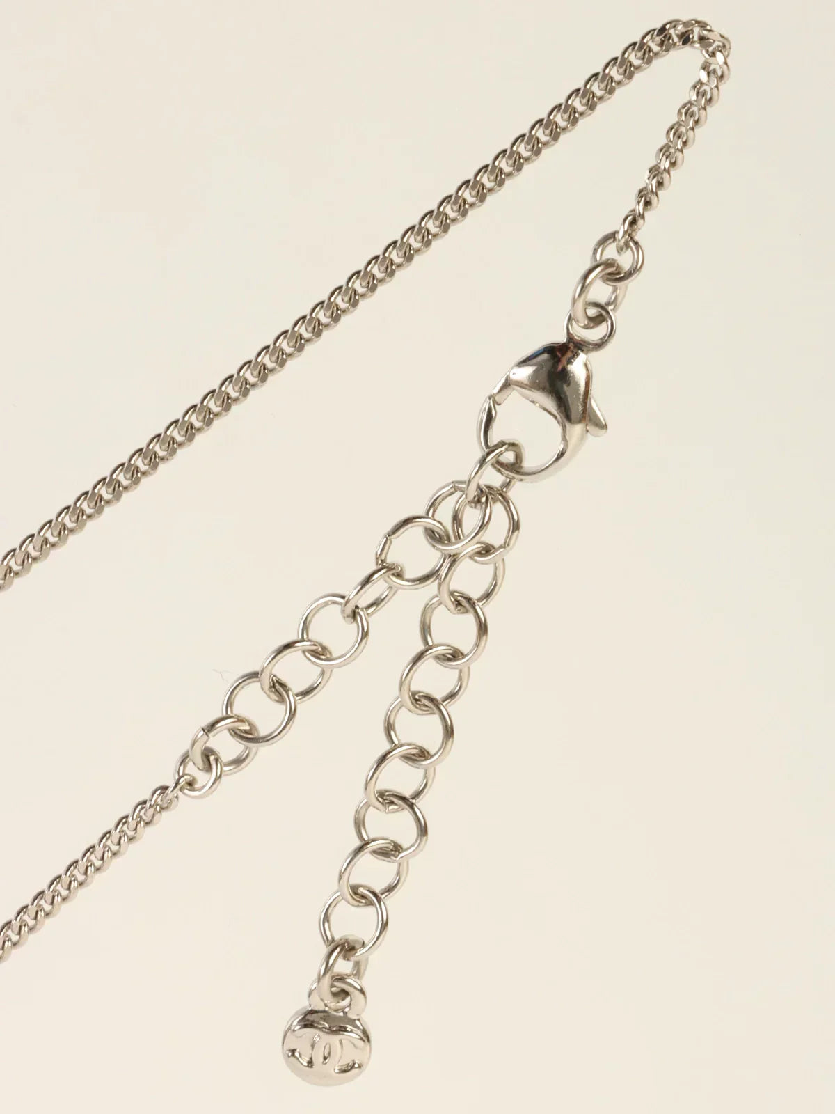 CHANEL 2012 Made Rhinestone Diamond Motif Cc Mark Swing Necklace Silver/Champagne