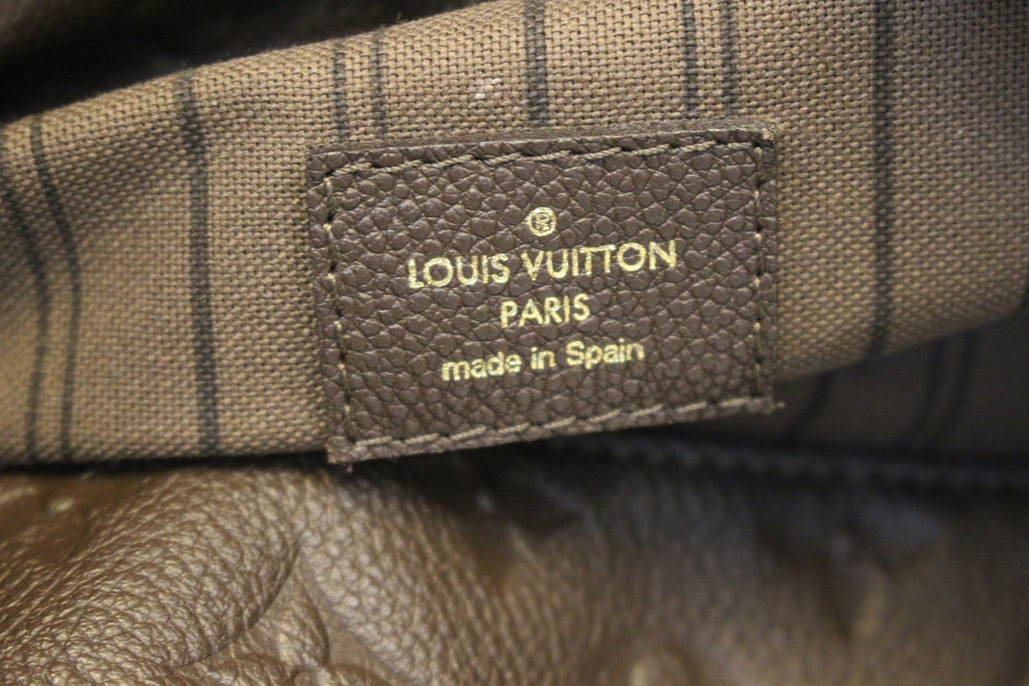 LOUIS VUITTON Terre Monogram Empreinte Leather Artsy MM Shoulder Bag