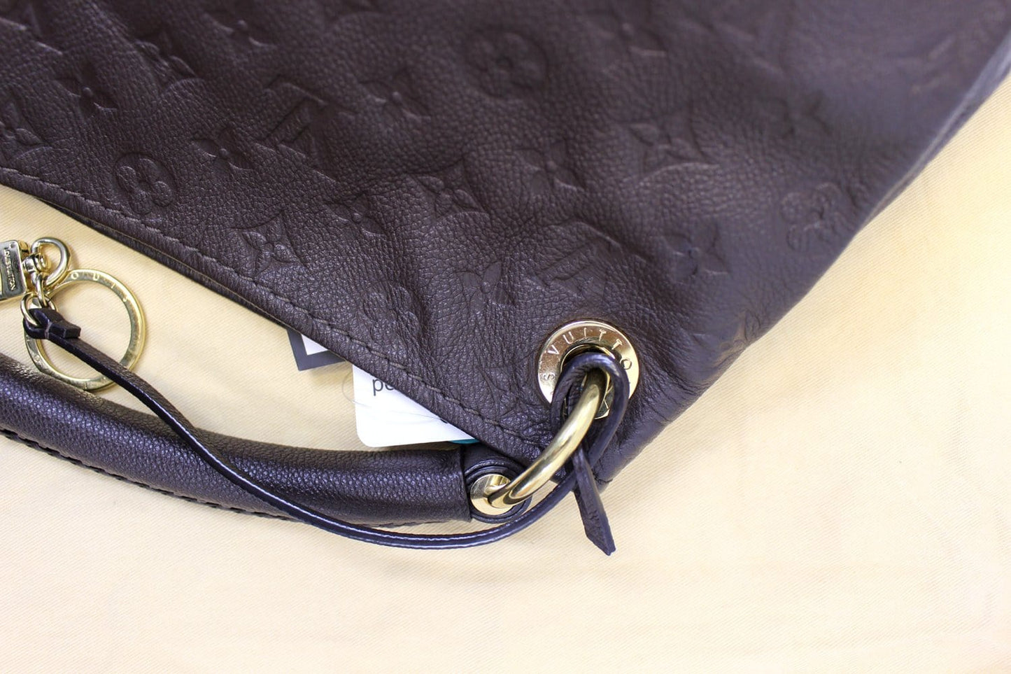 LOUIS VUITTON Terre Monogram Empreinte Leather Artsy MM Shoulder Bag
