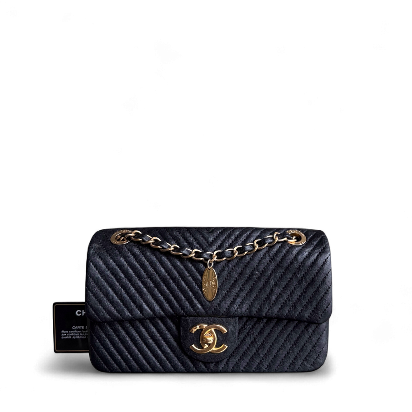 Chanel Seasonal Flap Small - 23CM Surpique CC Herringbone Medallion Flap Chevron Goatskin Black Gold Hardware Series 20