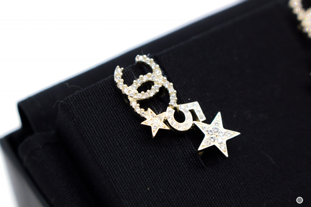 Chanel ABB Crystal CC Logo With Stars And Five   Gold / NH Metal .CMXCM Earrings Ghw