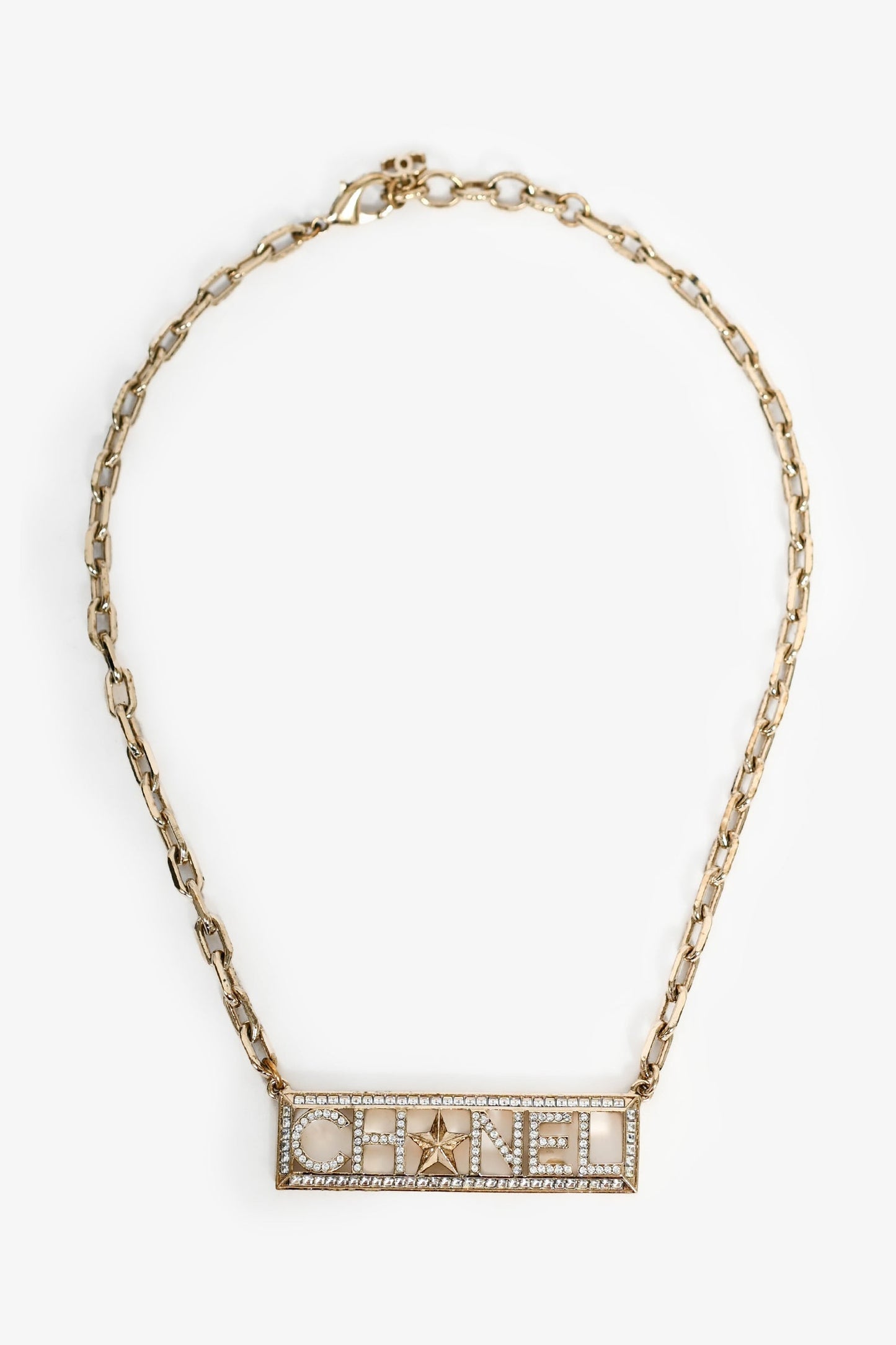 Pre-Loved Chanel™ 2017 Gold Toned Crystal Embellished Logo Star Choker Necklace