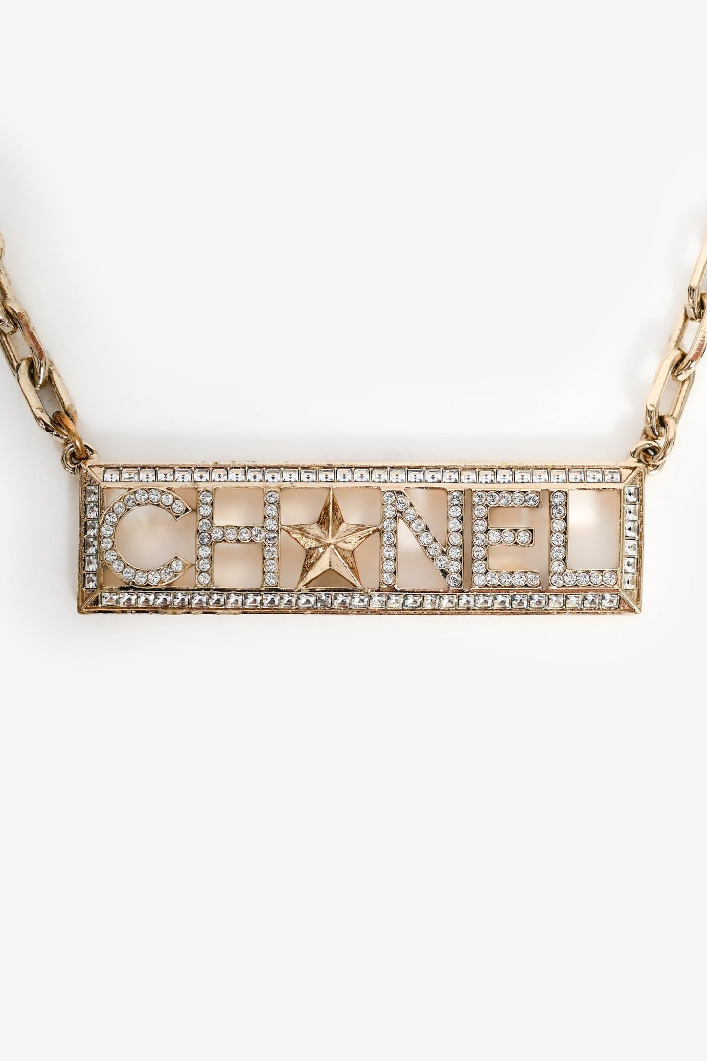 Pre-Loved Chanel™ 2017 Gold Toned Crystal Embellished Logo Star Choker Necklace