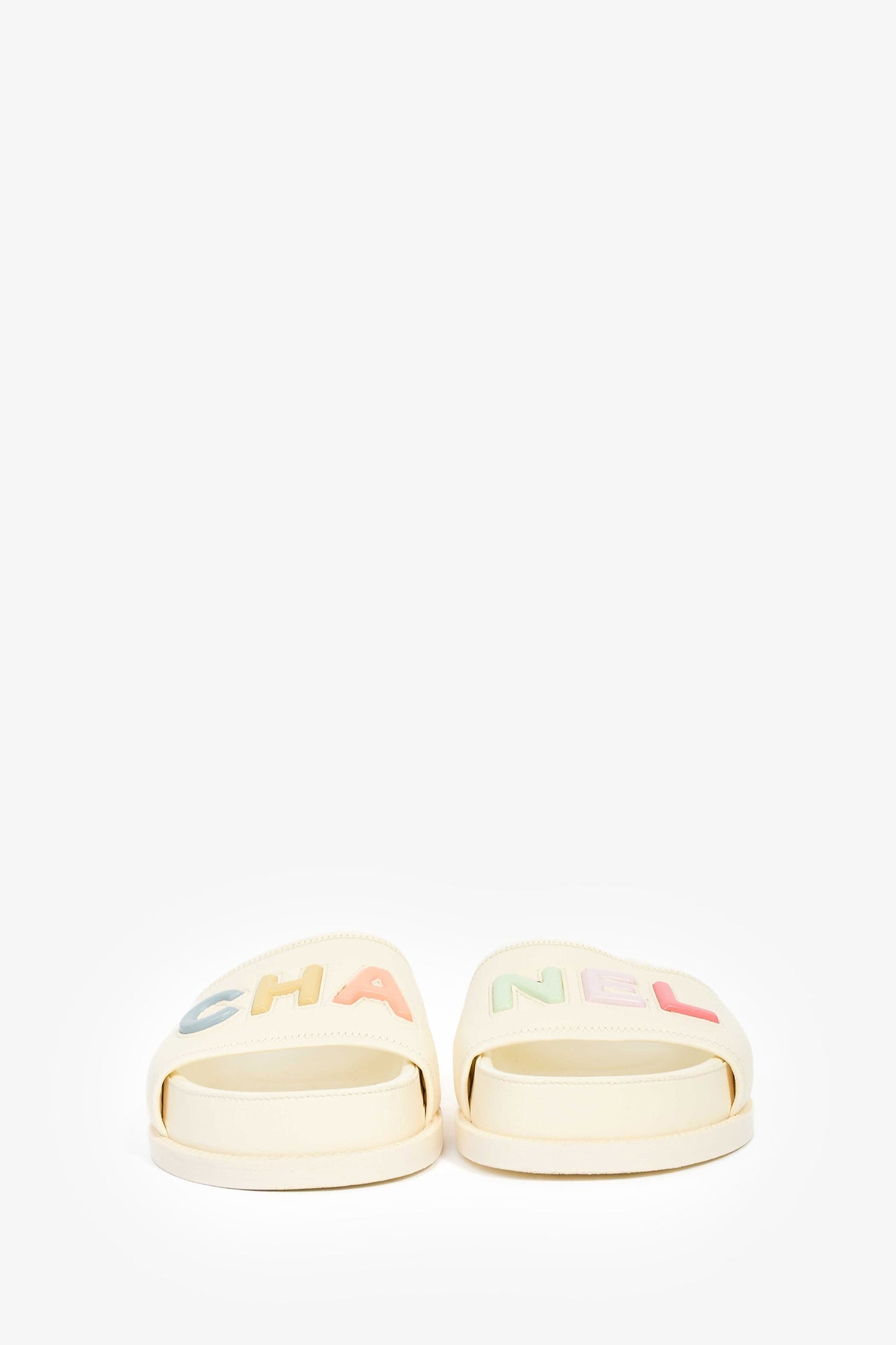 Pre-Loved Chanel™ 2022 Cream Leather Pastel 'CHANEL' Slides Size 38