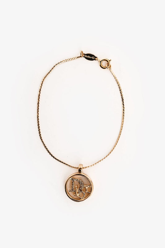 Christian Dior   Gold Tone Metal Logo Bracelet