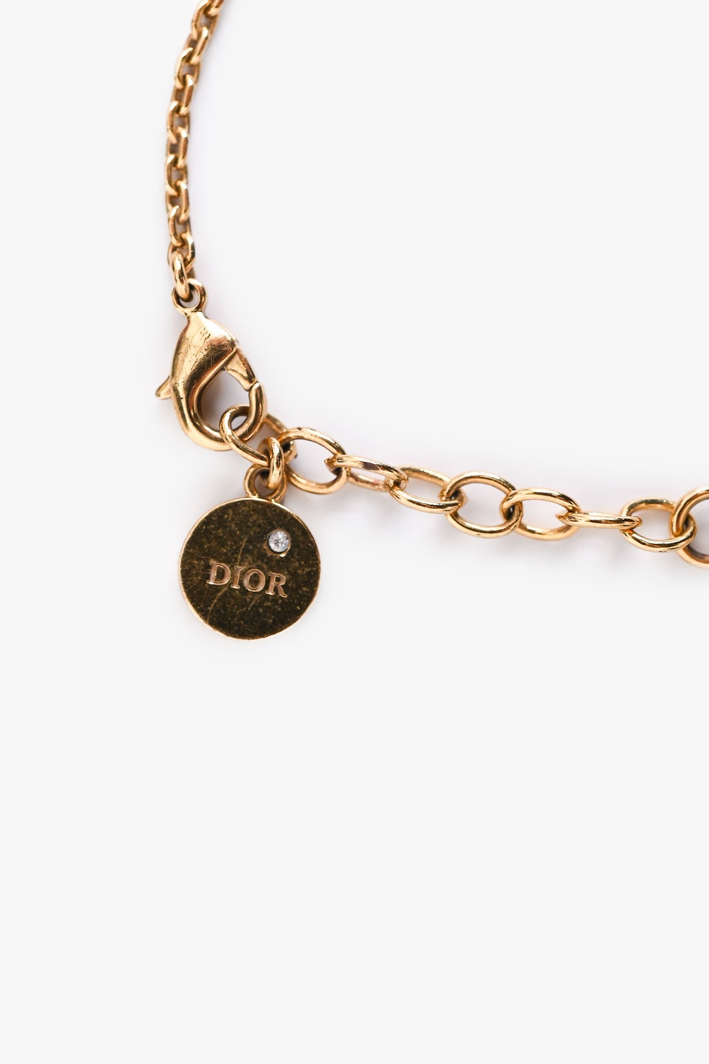Christian Dior Gold Tone Metal Crystal Set Logo Bracelet