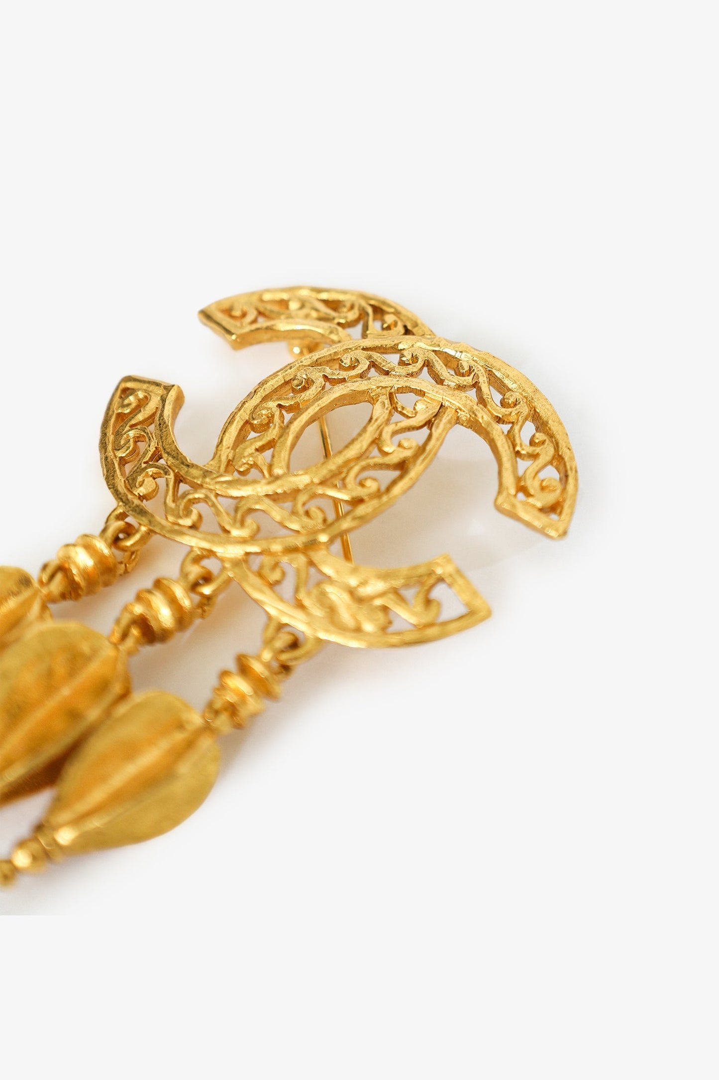 Pre-Loved Chanel™   Gold-tone Coco Mark Fretwork Fringe Brooch