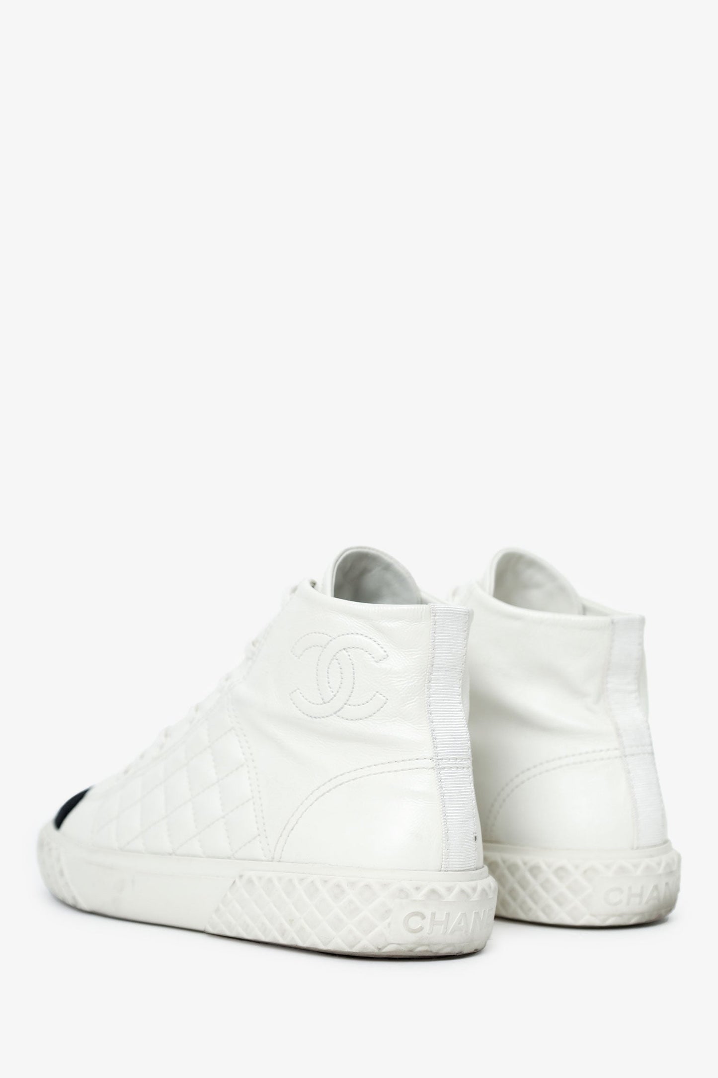 Pre-Loved Chanel™ White Quilted Leather CC Cap Toe High Top Sneaker Size 40