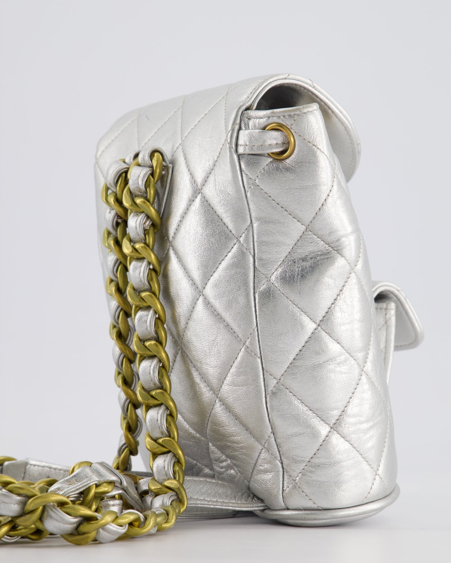 *RARE* Chanel Metallic Silver   Mini Duma Backpack Bag in Lambskin Leather with 24K Gold Hardware