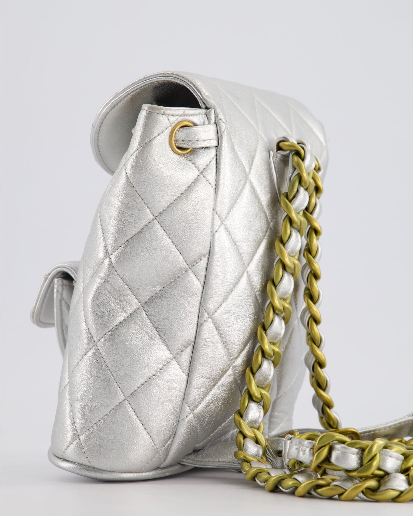 *RARE* Chanel Metallic Silver   Mini Duma Backpack Bag in Lambskin Leather with 24K Gold Hardware