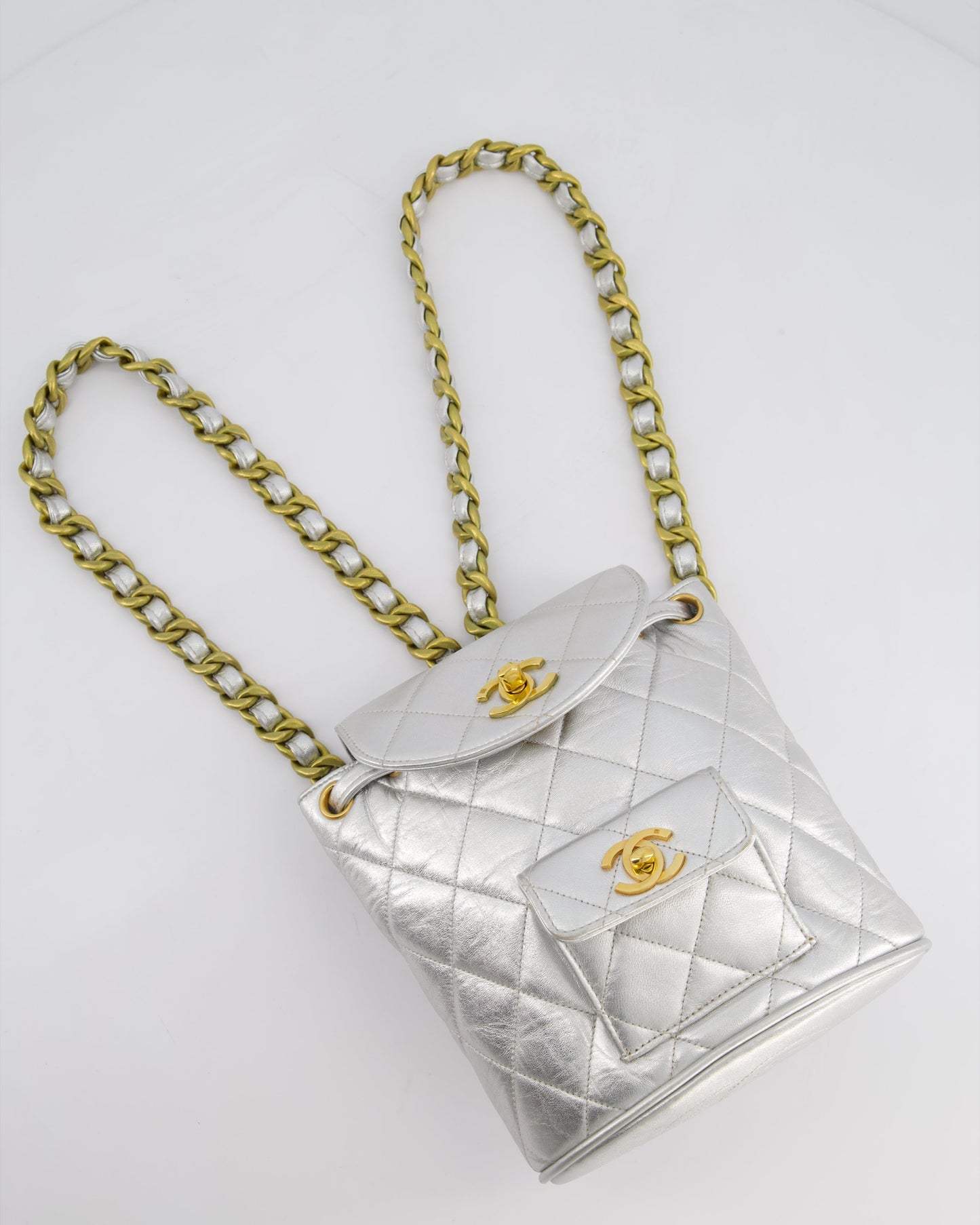 *RARE* Chanel Metallic Silver   Mini Duma Backpack Bag in Lambskin Leather with 24K Gold Hardware