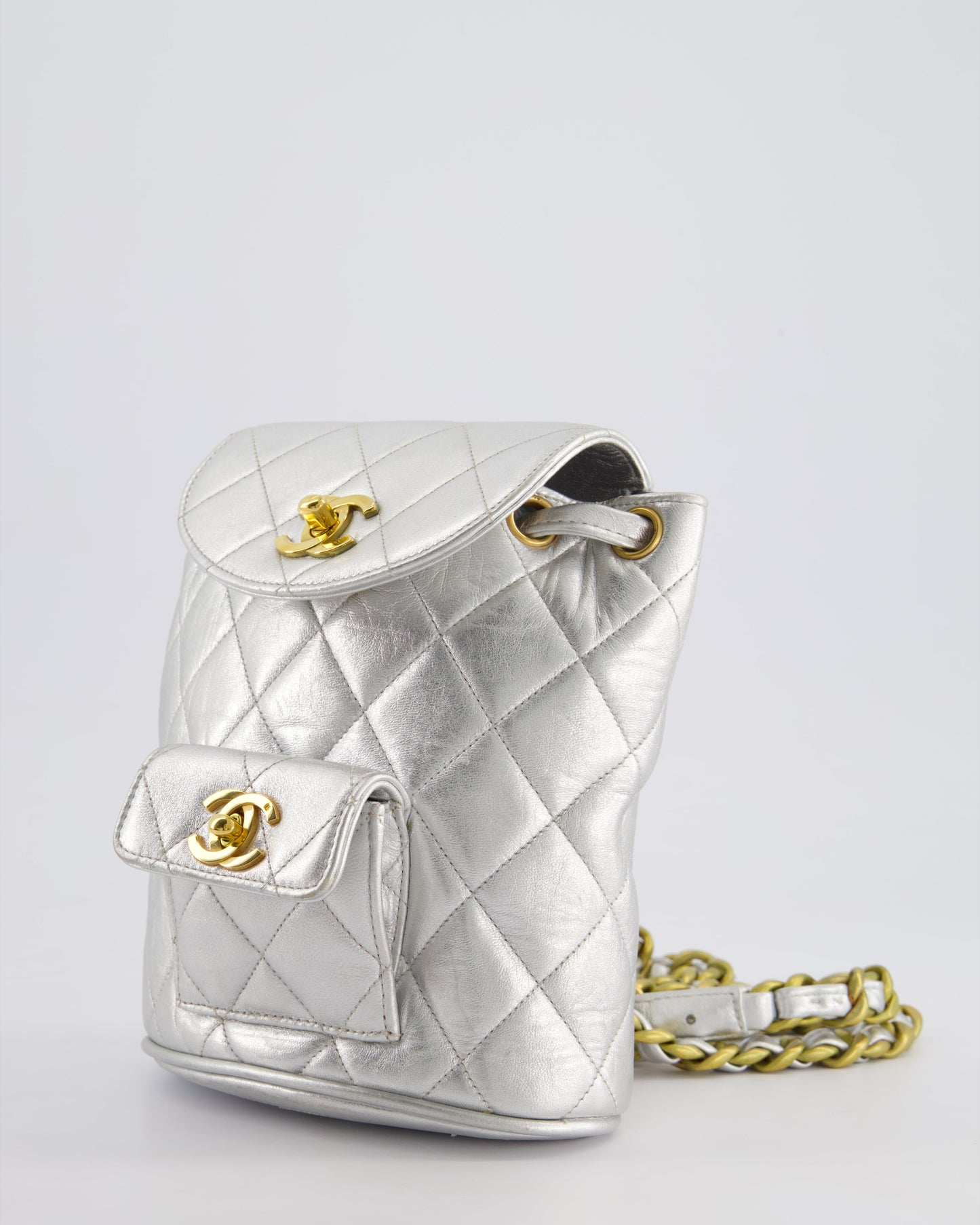 *RARE* Chanel Metallic Silver   Mini Duma Backpack Bag in Lambskin Leather with 24K Gold Hardware