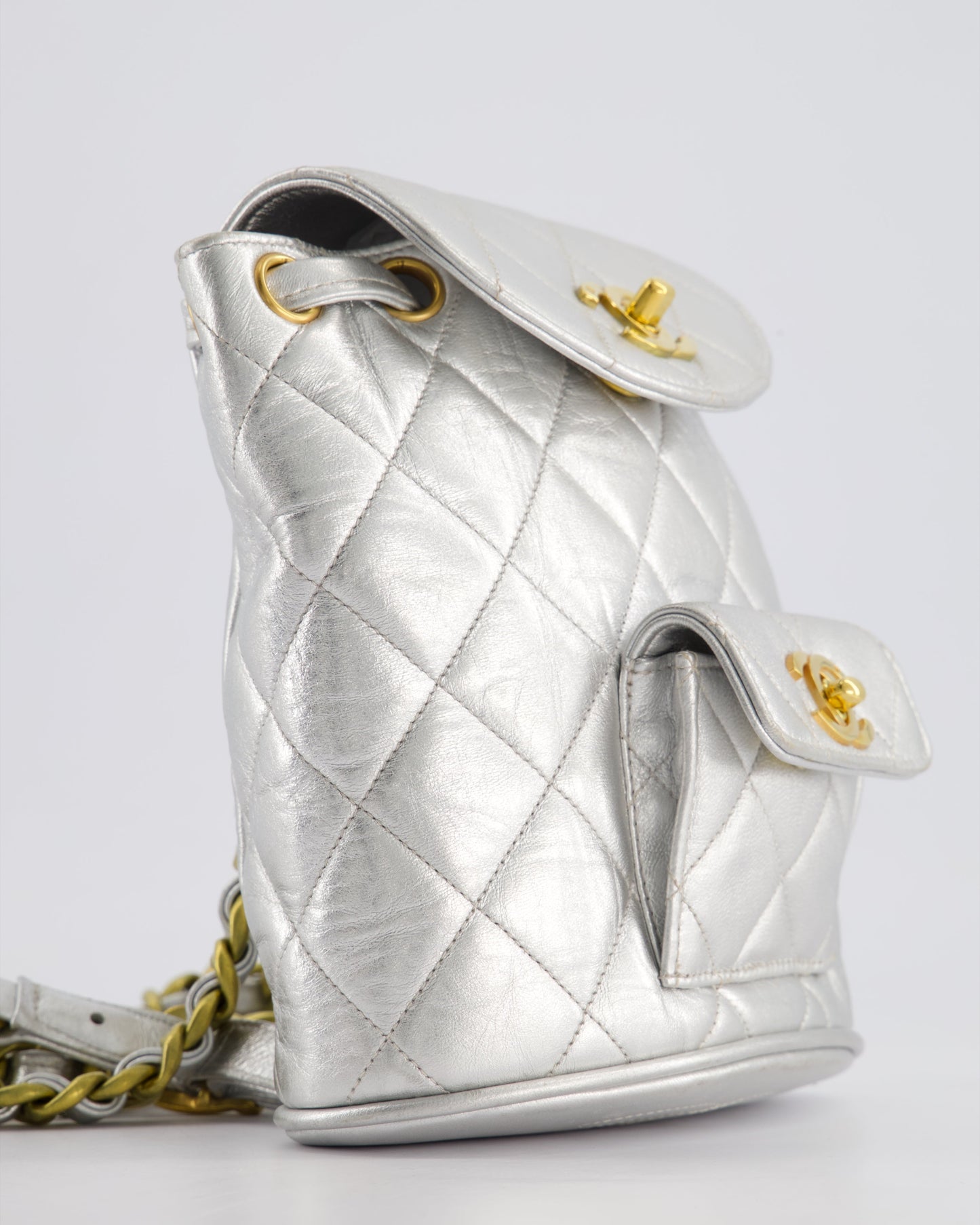 *RARE* Chanel Metallic Silver   Mini Duma Backpack Bag in Lambskin Leather with 24K Gold Hardware
