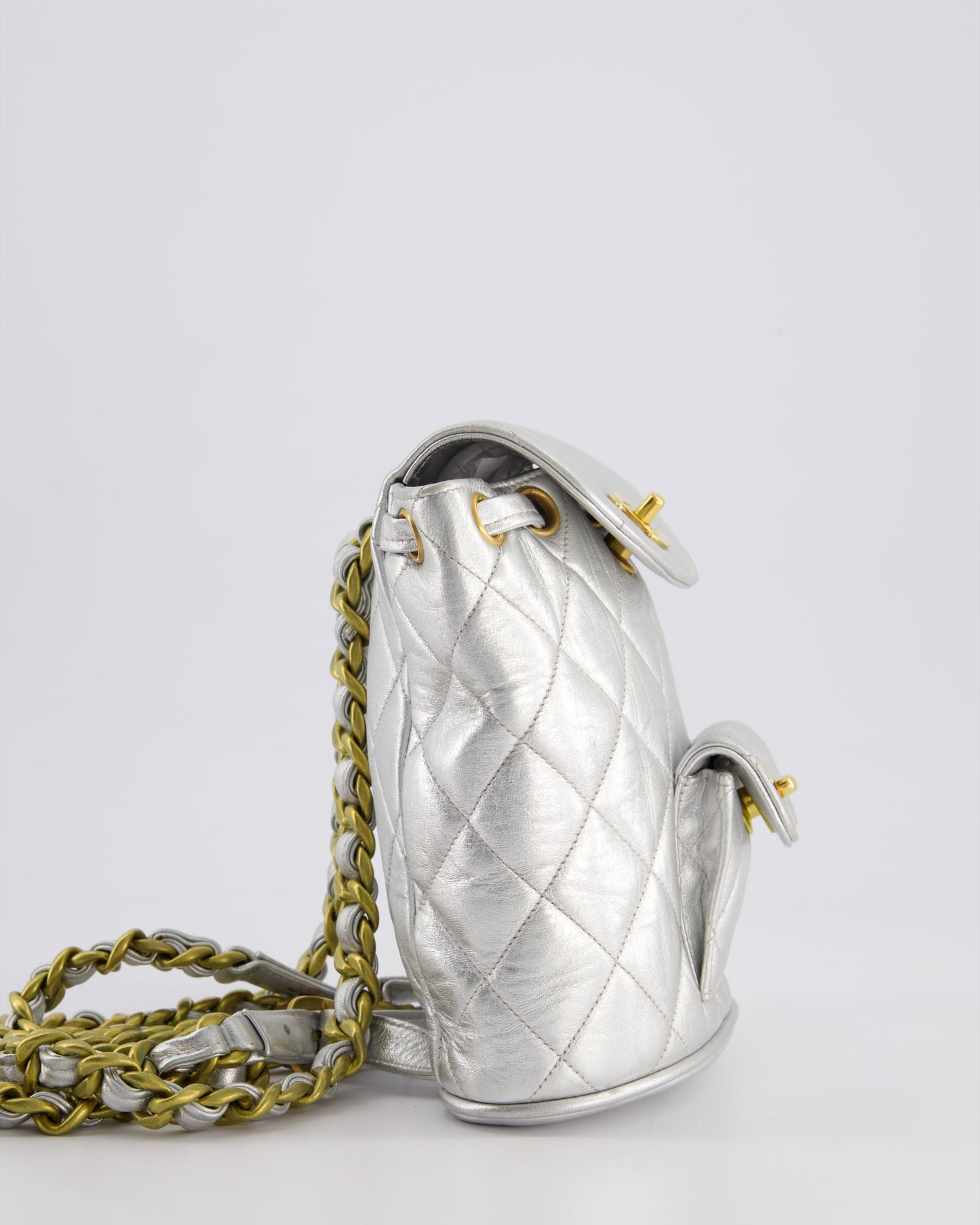 *RARE* Chanel Metallic Silver   Mini Duma Backpack Bag in Lambskin Leather with 24K Gold Hardware