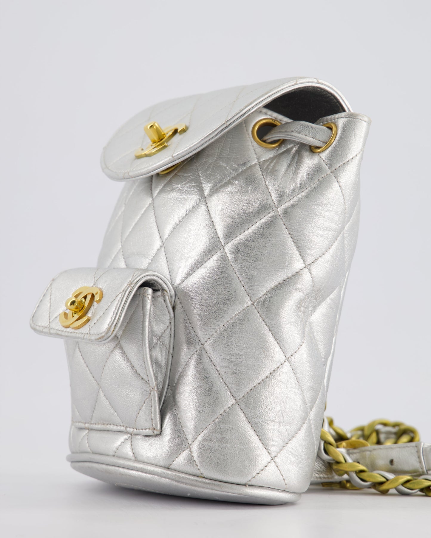 *RARE* Chanel Metallic Silver   Mini Duma Backpack Bag in Lambskin Leather with 24K Gold Hardware