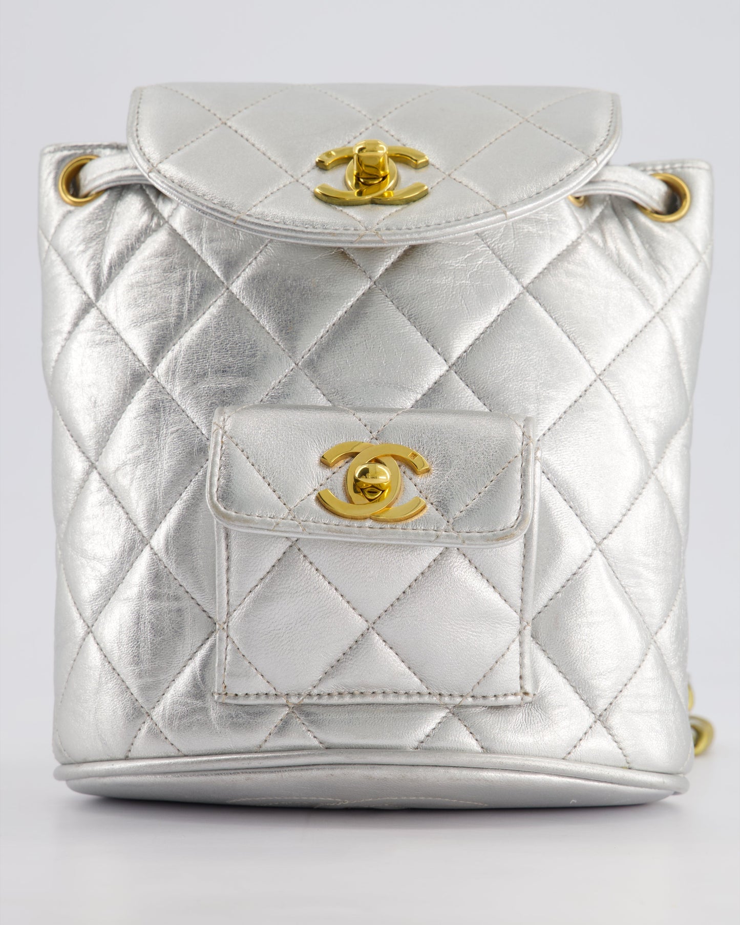 *RARE* Chanel Metallic Silver   Mini Duma Backpack Bag in Lambskin Leather with 24K Gold Hardware