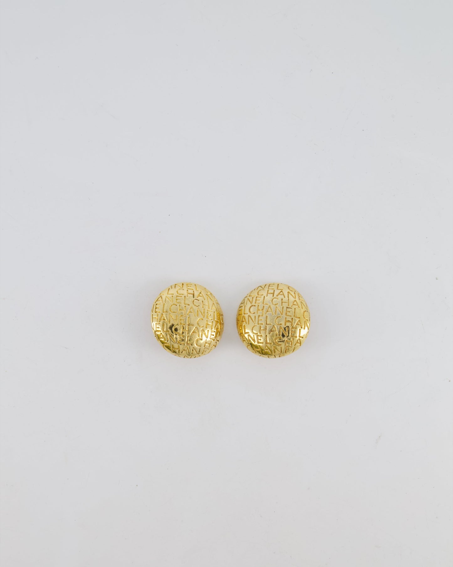 Chanel   Gold Round Clip-On Earrings with Embossed Chanel Details