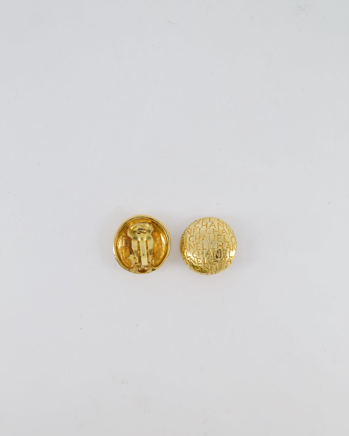 Chanel   Gold Round Clip-On Earrings with Embossed Chanel Details