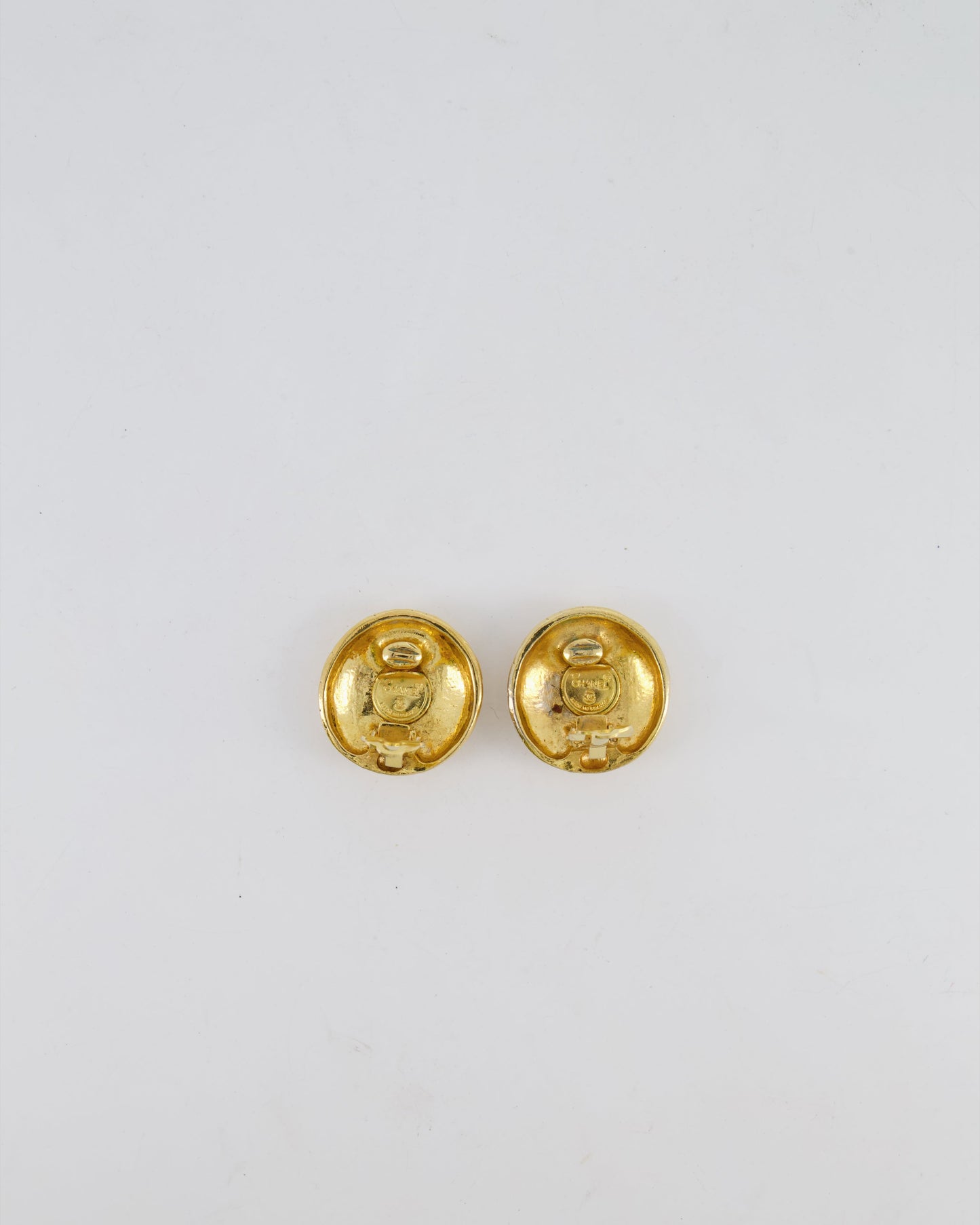 Chanel   Gold Round Clip-On Earrings with Embossed Chanel Details