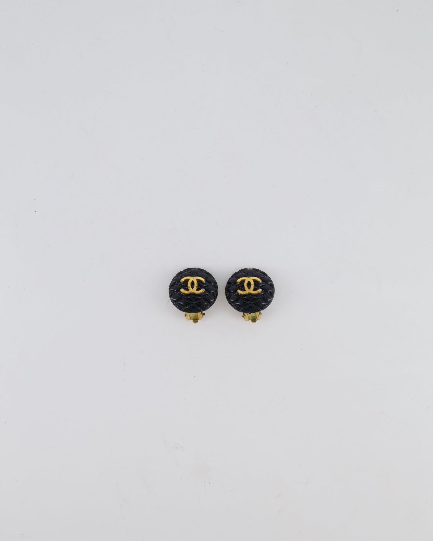 Chanel 94P   Black Matelasse Small Round Clip-On Earrings with Gold CC Logo