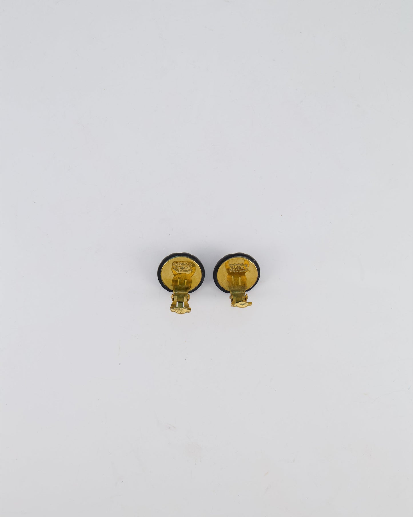 Chanel 94P   Black Matelasse Small Round Clip-On Earrings with Gold CC Logo