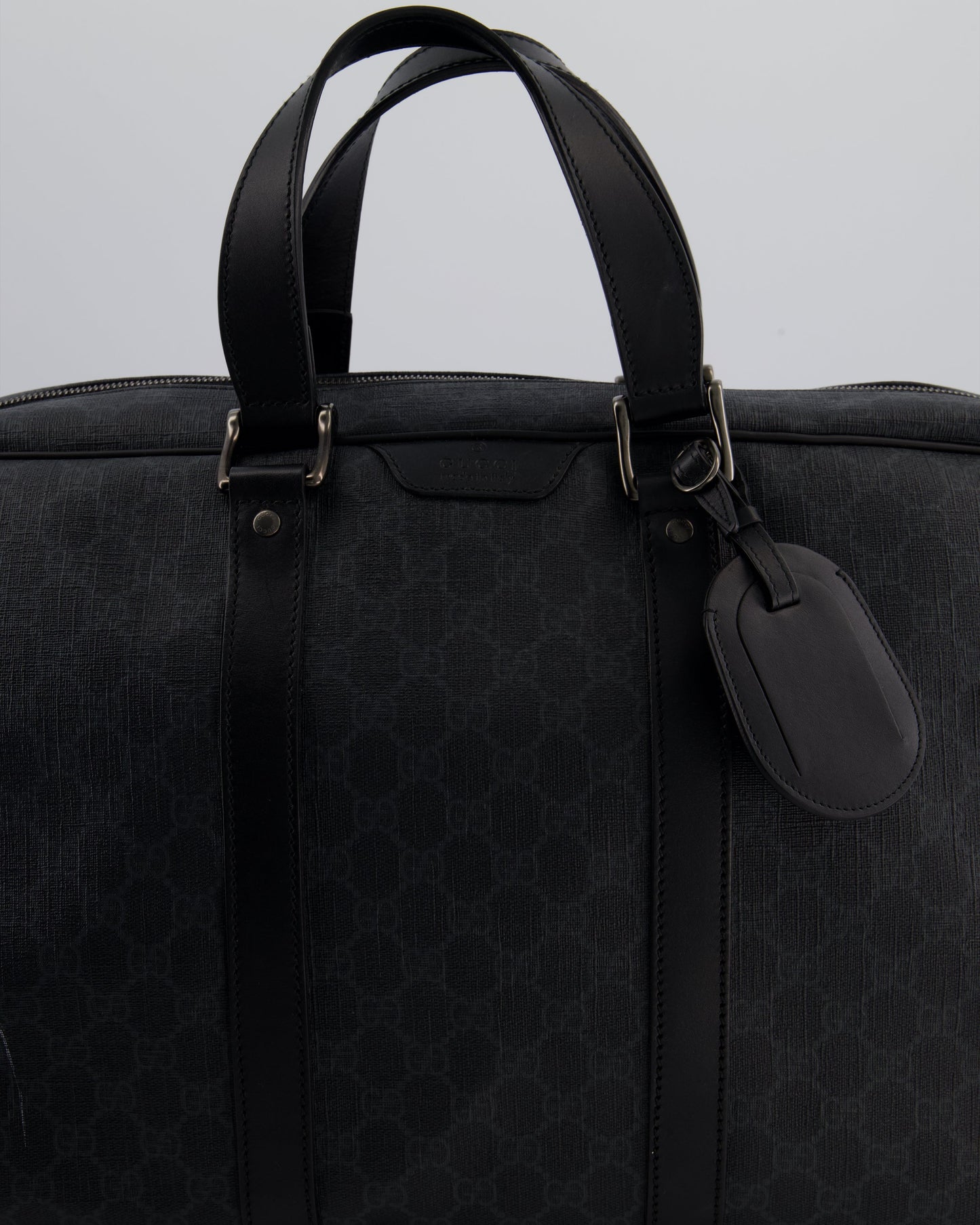 Gucci Black GG Carry On Duffle Bag in Supreme Coated Canvas with Leather Handles Detail