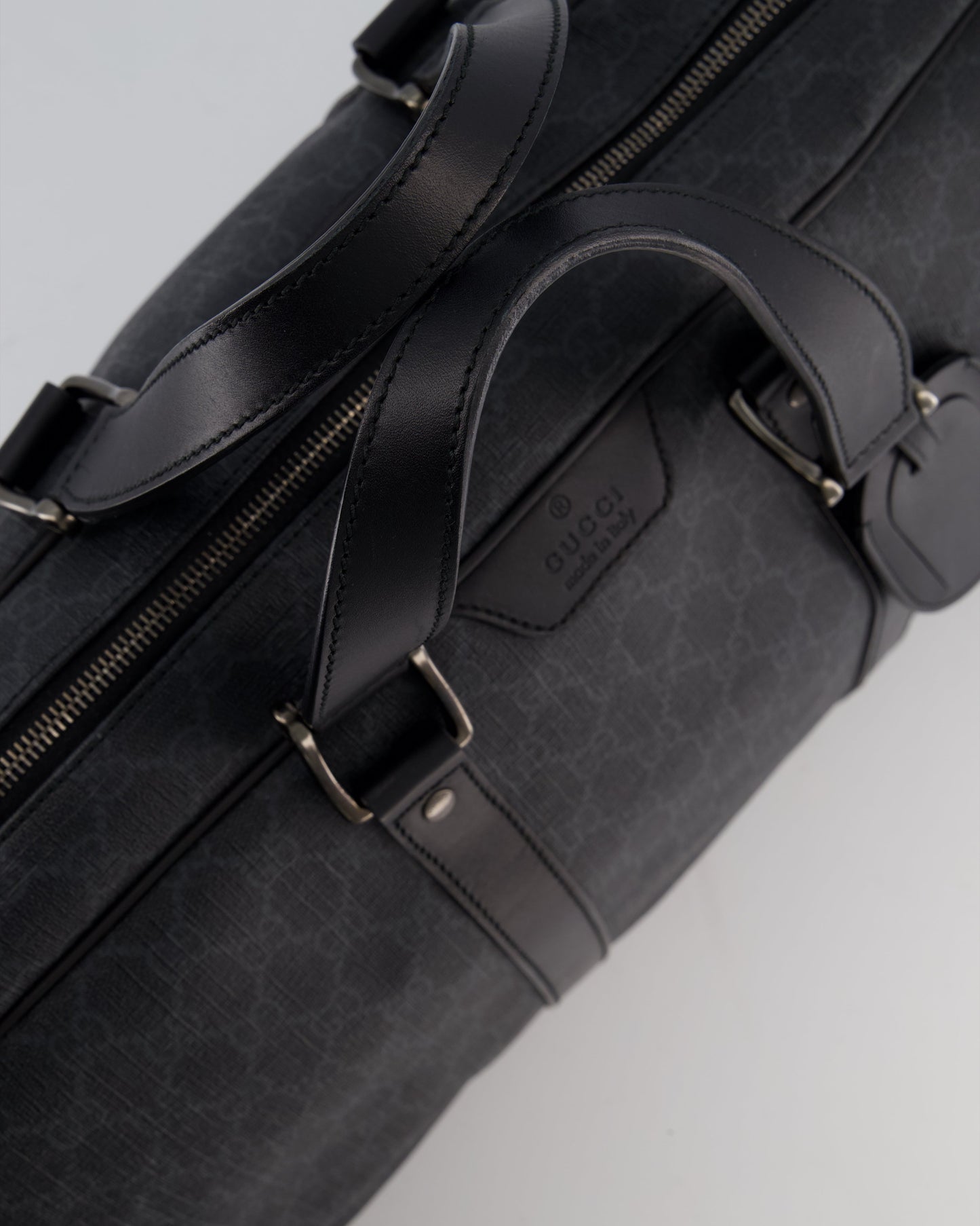 Gucci Black GG Carry On Duffle Bag in Supreme Coated Canvas with Leather Handles Detail