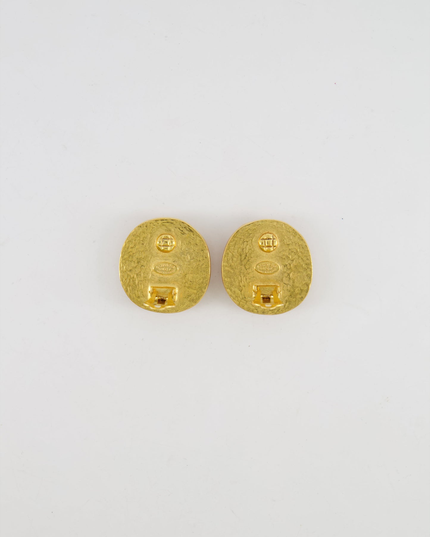 Chanel   98P Orange Rounded Clip On Earrings with Gold Rim and CC Logo Detail