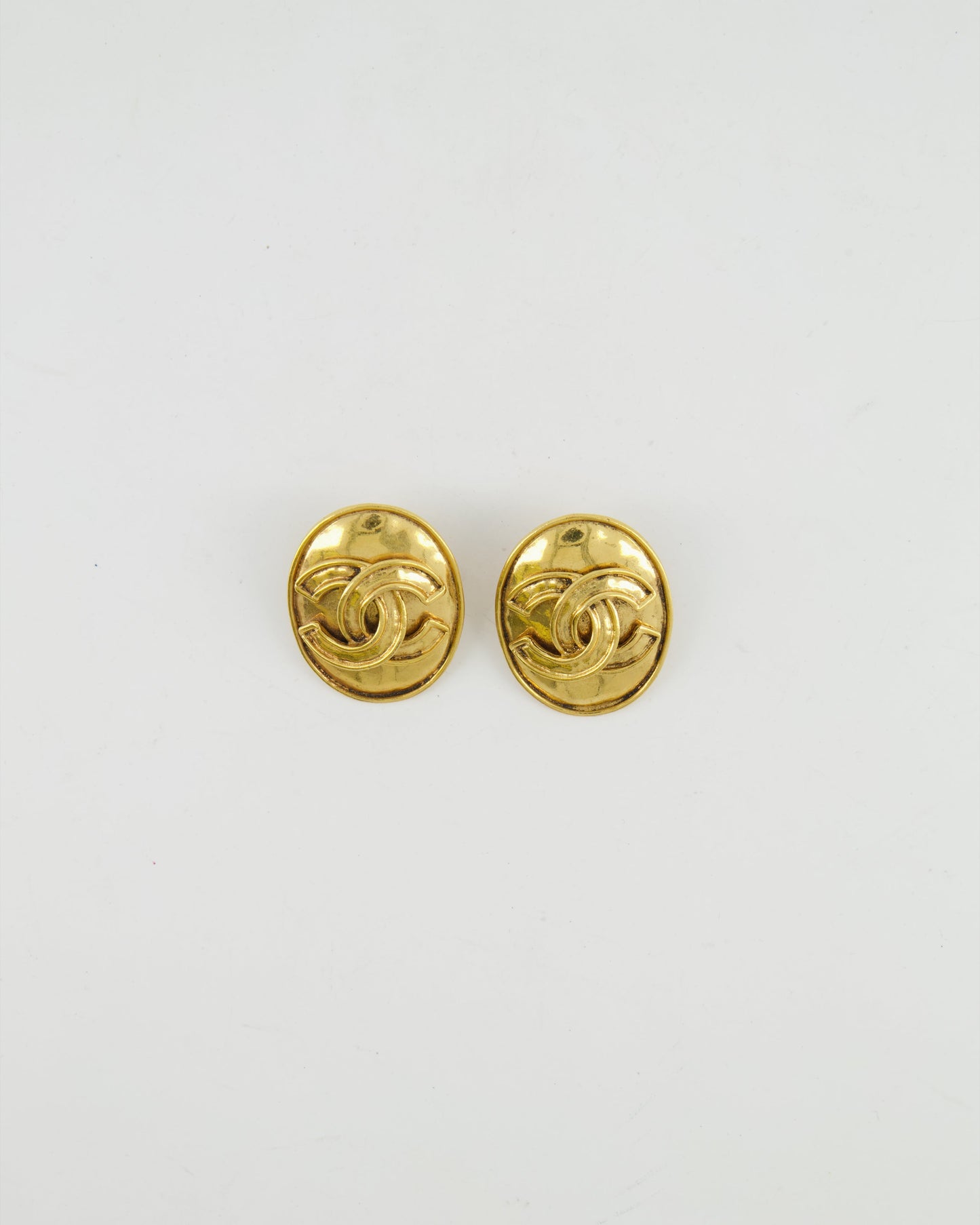 Chanel   94P Gold Polished Oval Clip On Earrings with CC Logo