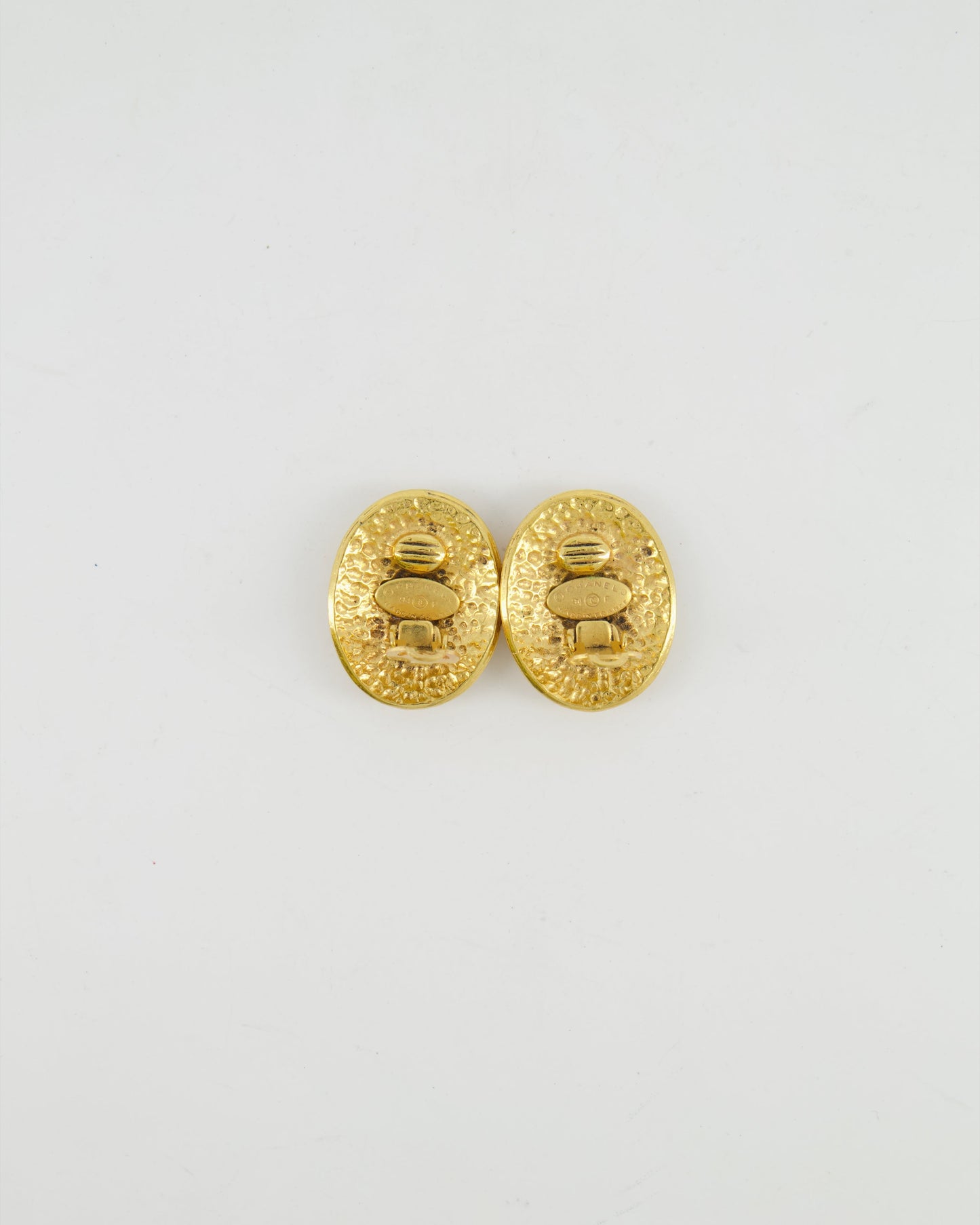 Chanel   94P Gold Polished Oval Clip On Earrings with CC Logo