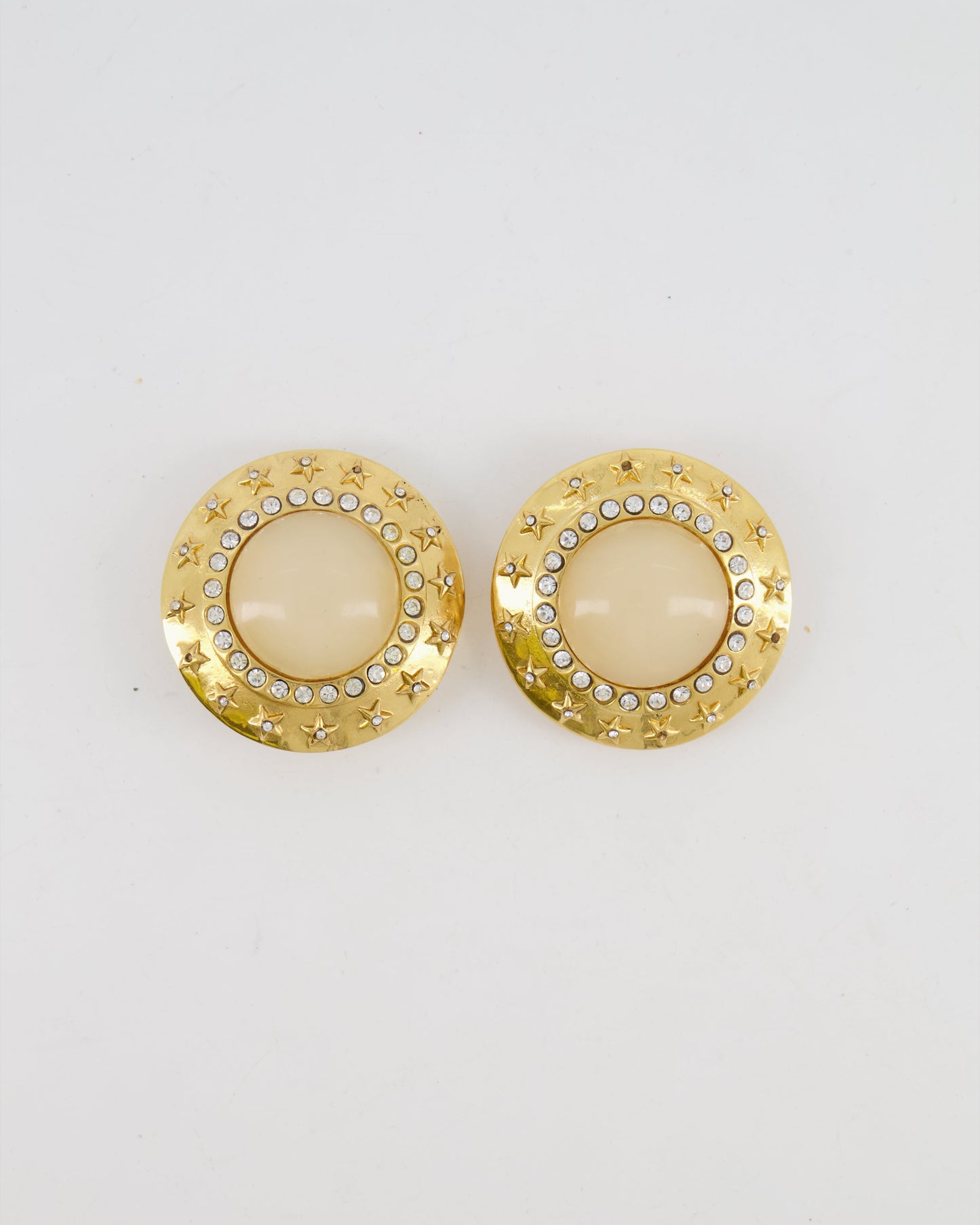 Chanel 2003   Gold Large Round Clip On Earrings with Beige Stone, Stars and Crystal Embellishments