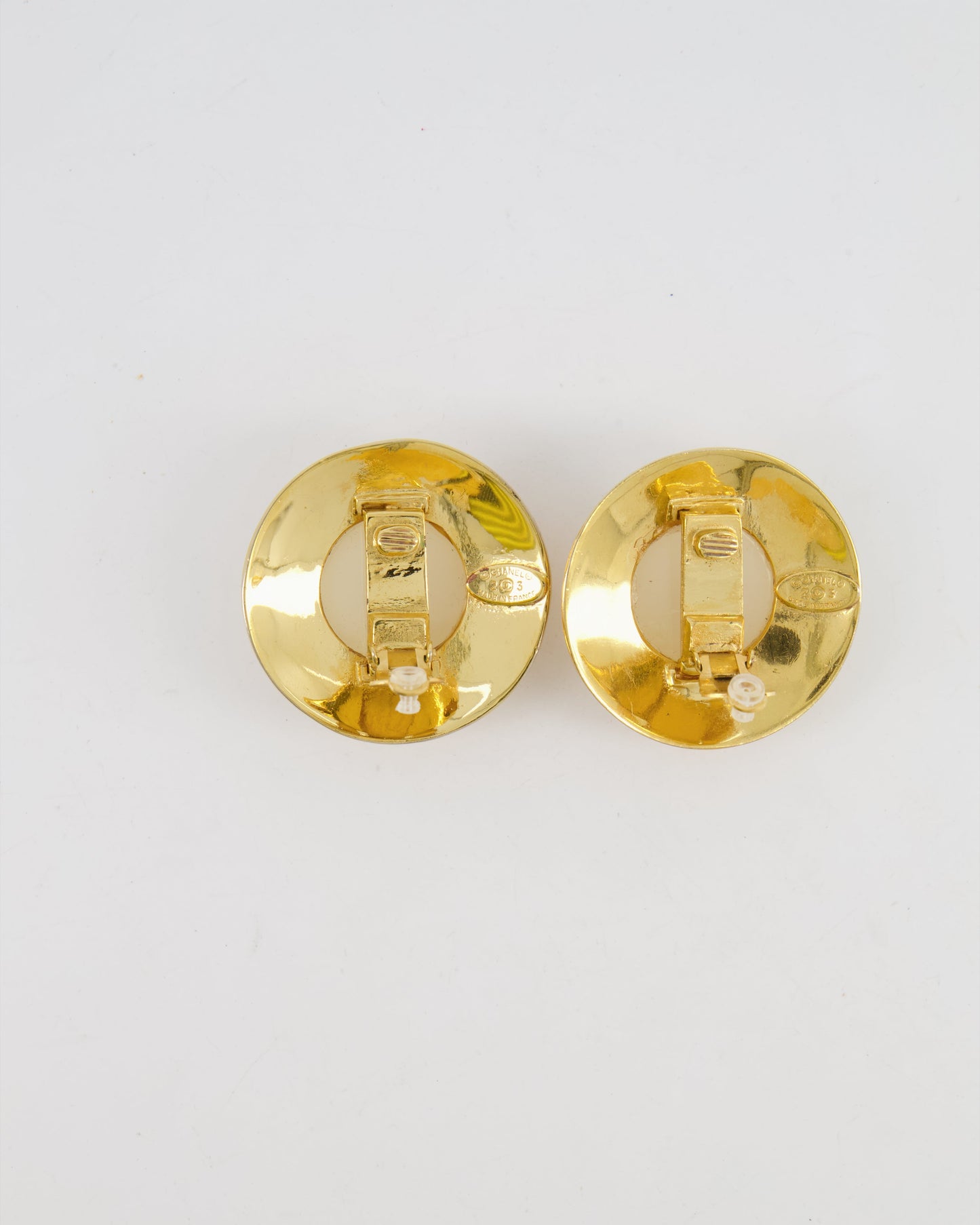 Chanel 2003   Gold Large Round Clip On Earrings with Beige Stone, Stars and Crystal Embellishments