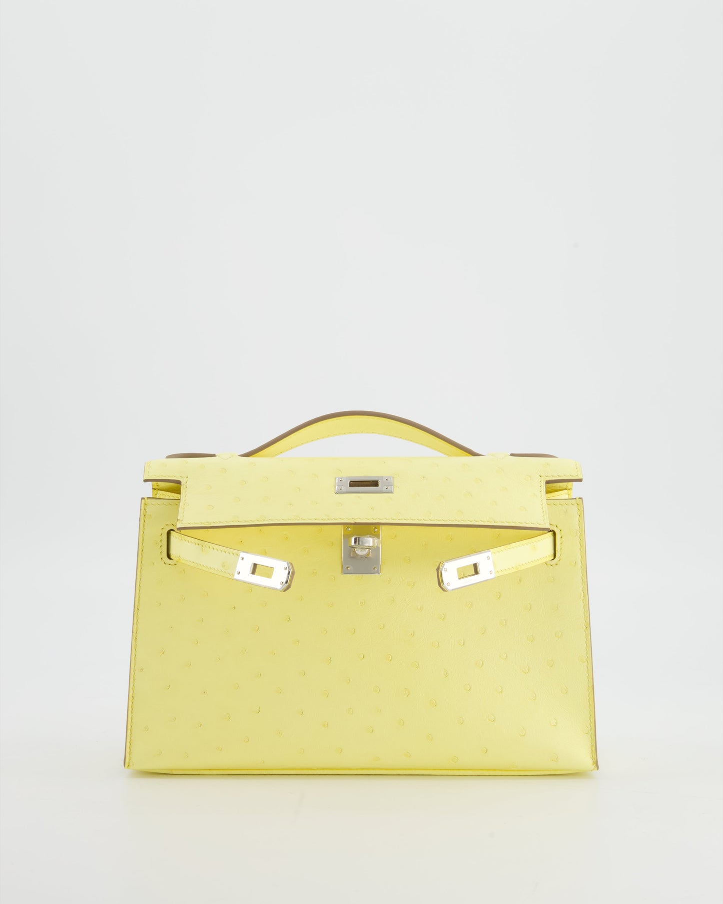 Herm�s Kelly Pochette Bag in Limoncello Ostrich Leather with Palladium Hardware