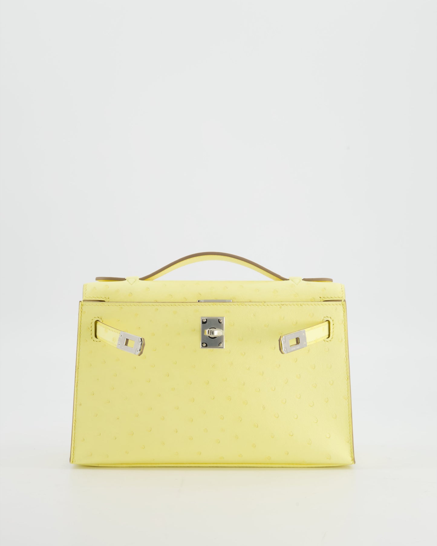 Herm�s Kelly Pochette Bag in Limoncello Ostrich Leather with Palladium Hardware
