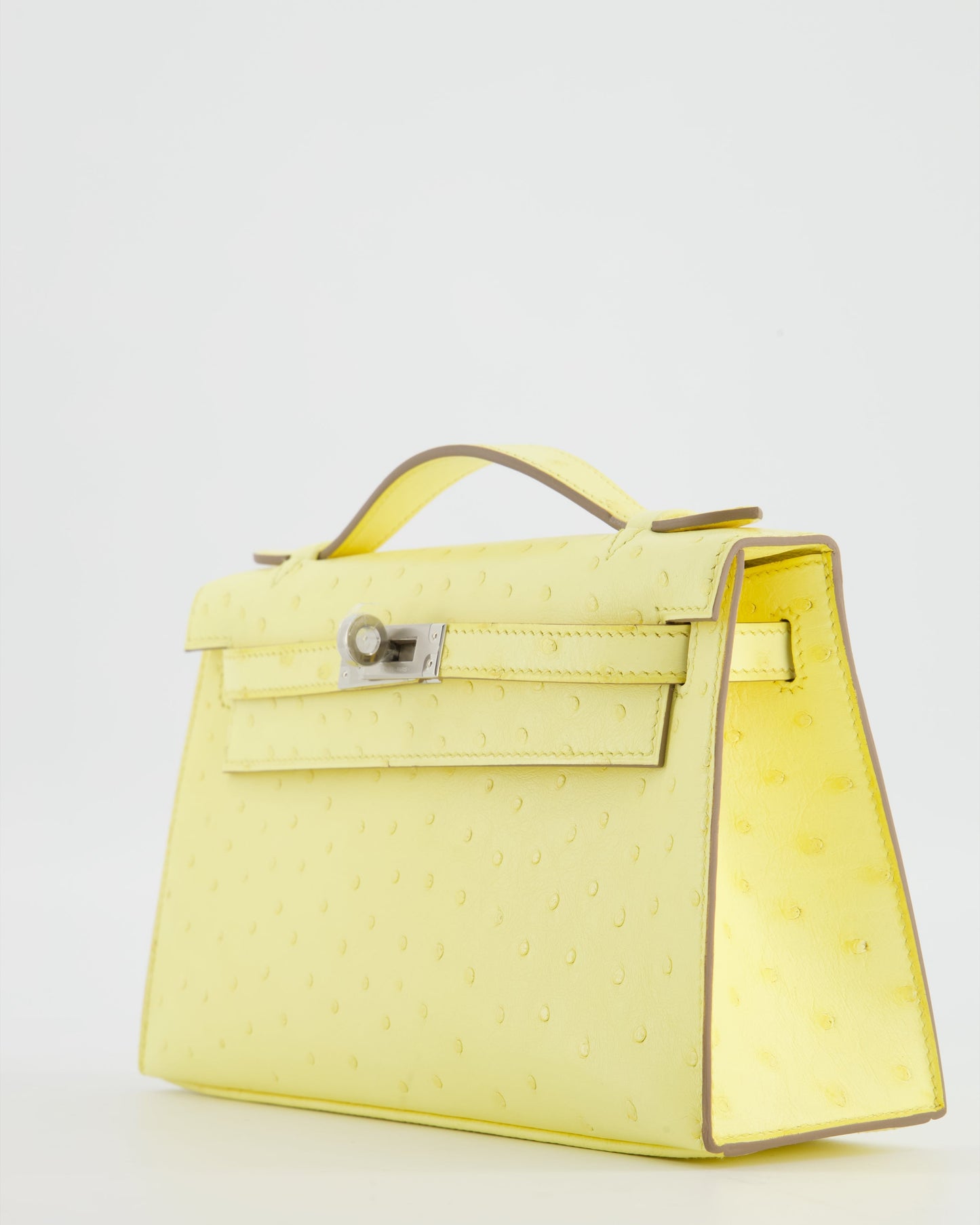 Herm�s Kelly Pochette Bag in Limoncello Ostrich Leather with Palladium Hardware
