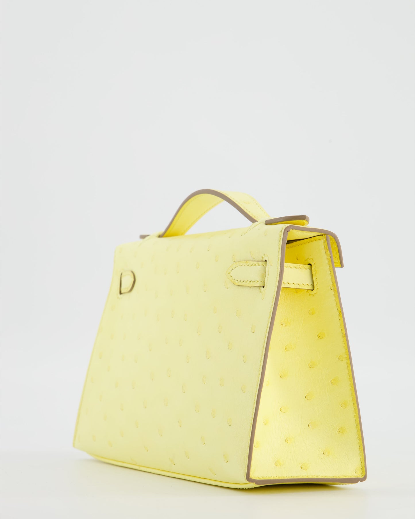 Herm�s Kelly Pochette Bag in Limoncello Ostrich Leather with Palladium Hardware