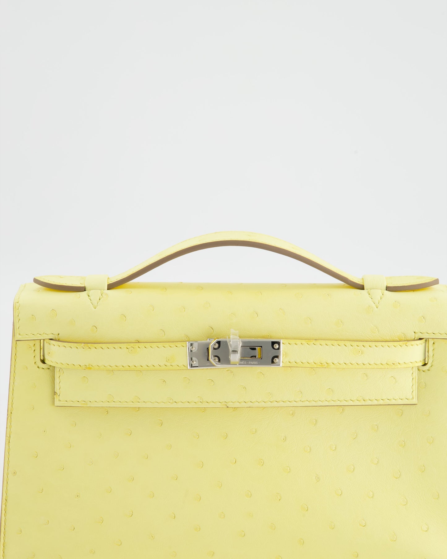 Herm�s Kelly Pochette Bag in Limoncello Ostrich Leather with Palladium Hardware