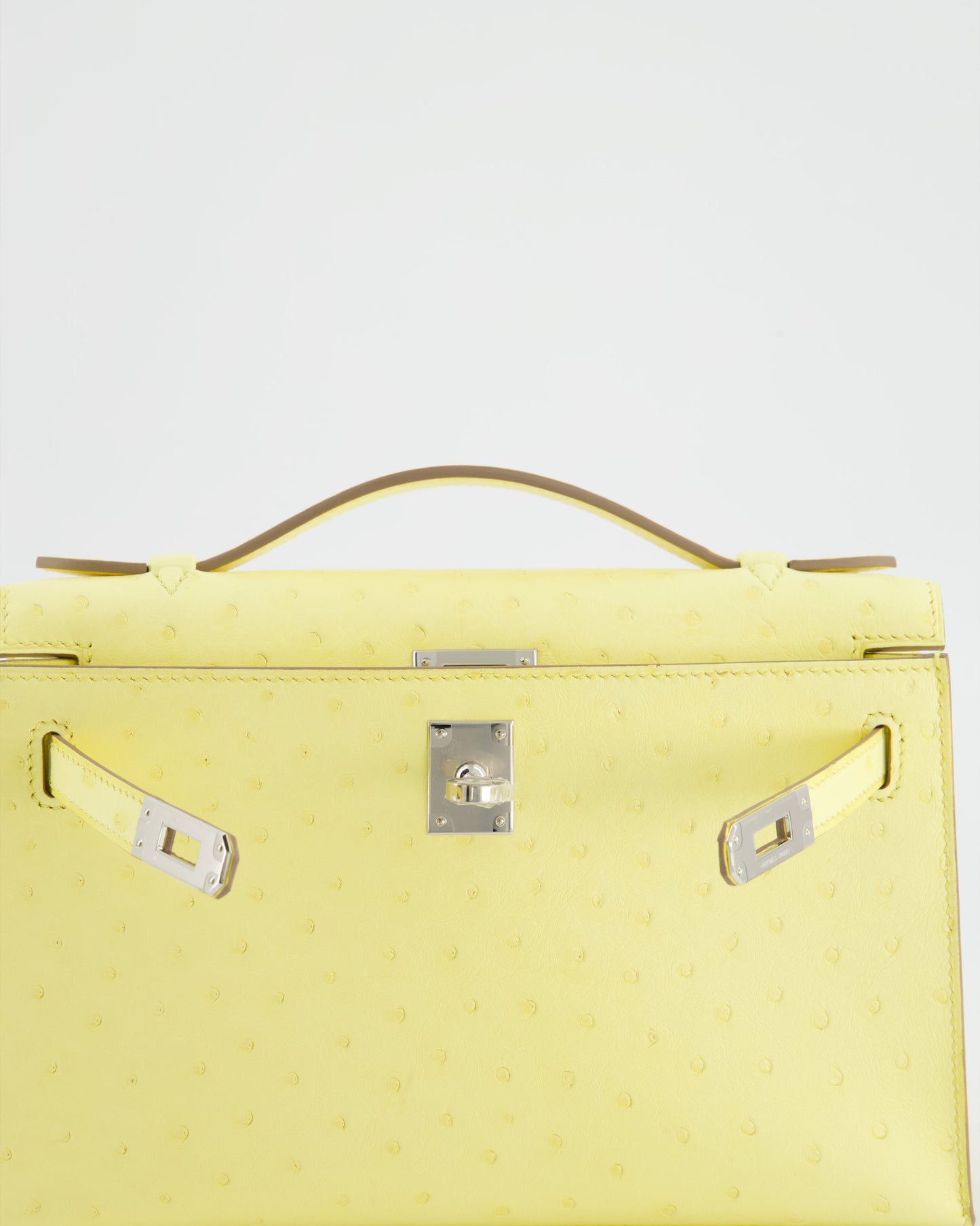 Herm�s Kelly Pochette Bag in Limoncello Ostrich Leather with Palladium Hardware