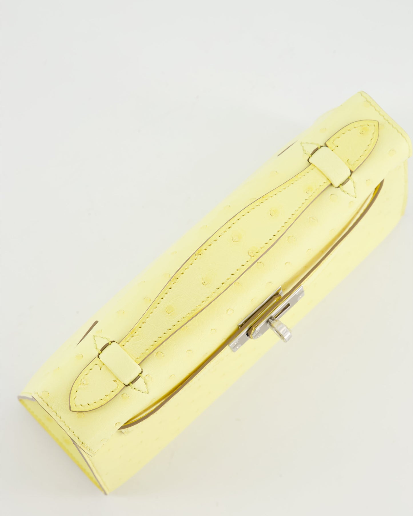 Herm�s Kelly Pochette Bag in Limoncello Ostrich Leather with Palladium Hardware