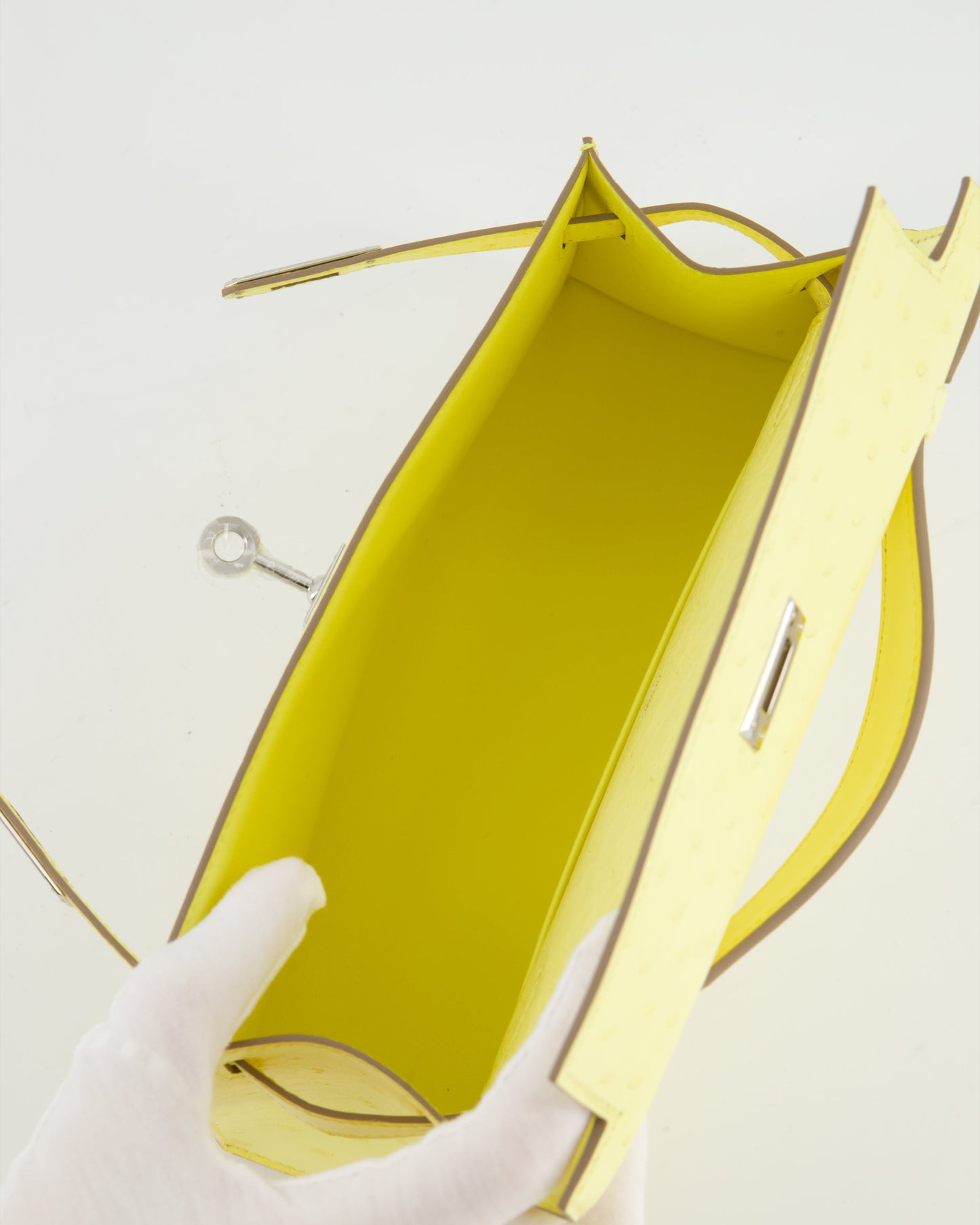 Herm�s Kelly Pochette Bag in Limoncello Ostrich Leather with Palladium Hardware